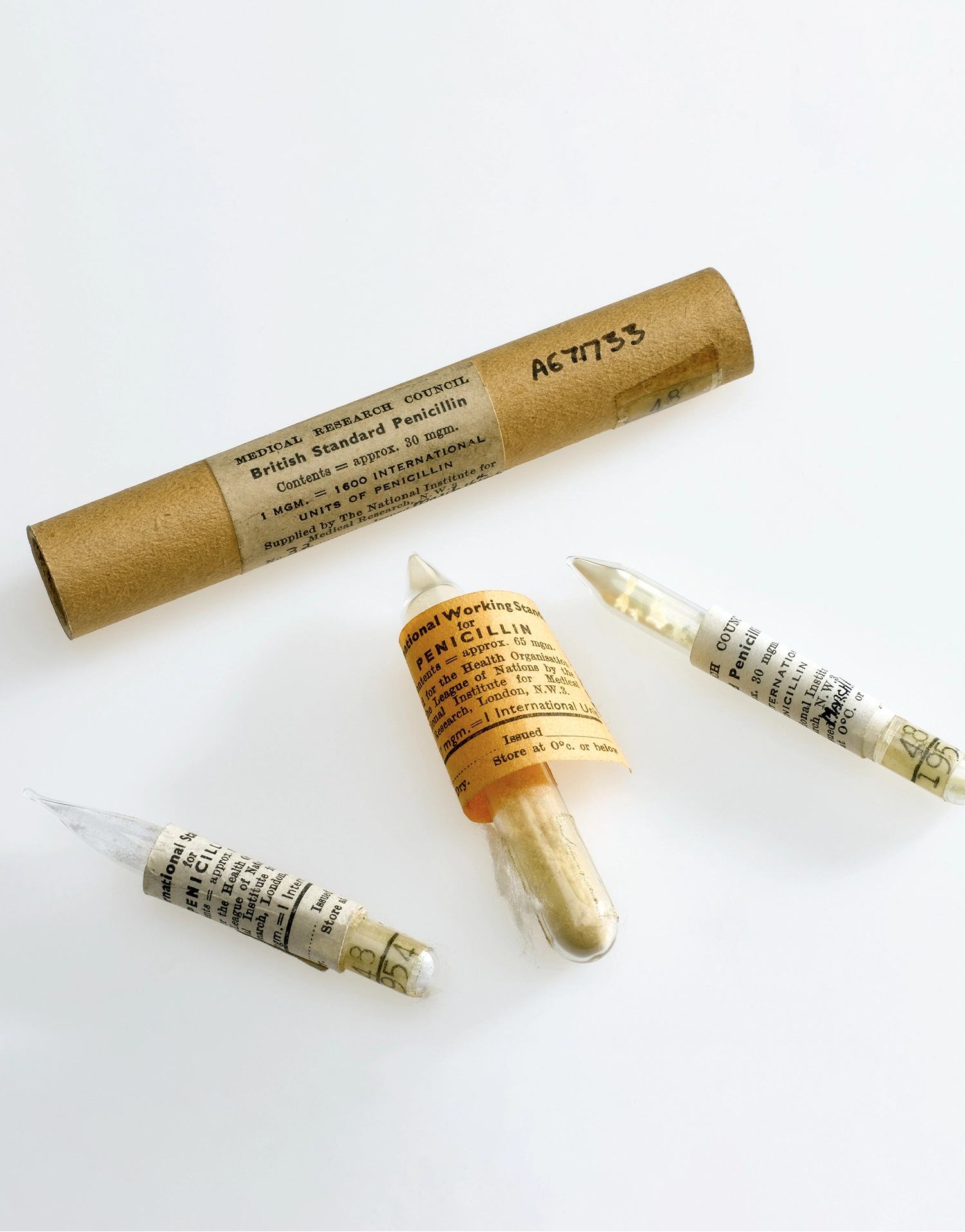 Three glass ampules labeled “penicillin.”